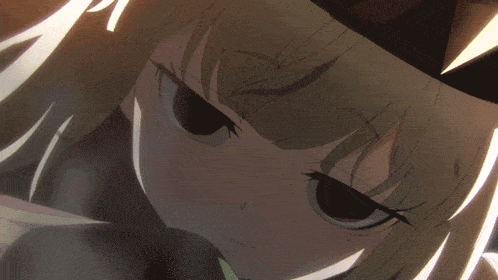 a close up of a girl with a hat on her head