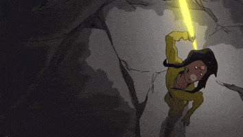 a yellow light is shining on a brick wall .