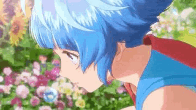 a girl with blue hair is standing in front of a garden of flowers .