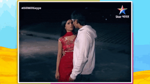 a man and a woman are kissing in a star india ad