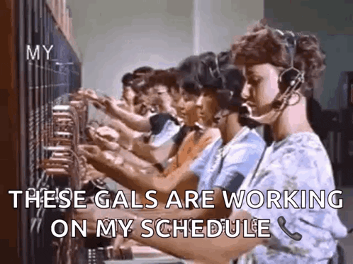 a group of women wearing headsets are working on a phone .