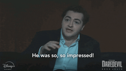 a man in a suit and white shirt says he was so impressed
