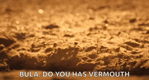 a close up of a sandy surface with the words bula do you has vermouth written on it