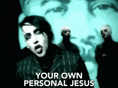 marilyn manson says " your own personal jesus " in front of a picture of jesus