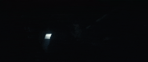 a close up of a monster in the dark