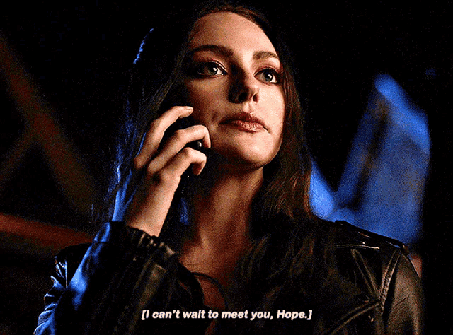 a woman talking on a cell phone with the words " i can 't wait to meet you hope "
