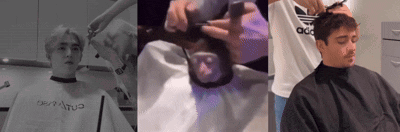 a man is getting his hair cut by a hairdresser while wearing an adidas shirt .