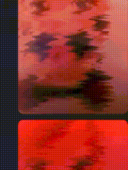 a red background with a black border and a few dots