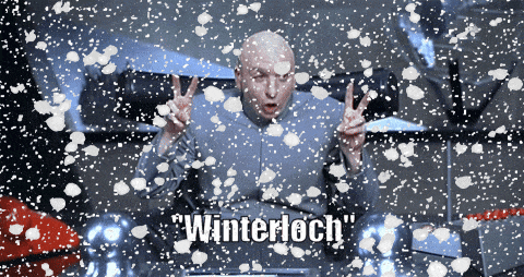 a man giving a peace sign in front of a snowy background with the word winterloch