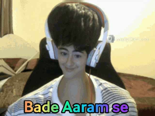 a person wearing headphones with the words bade aaram se on their chest