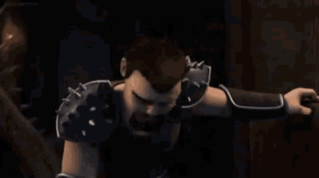 a cartoon man with a beard and spikes on his arms is standing in a dark room .