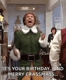 a man in a green elf costume is standing in a room with his mouth open and shouting .