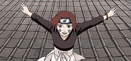 a girl in a headband is standing on a tiled roof with her arms outstretched .