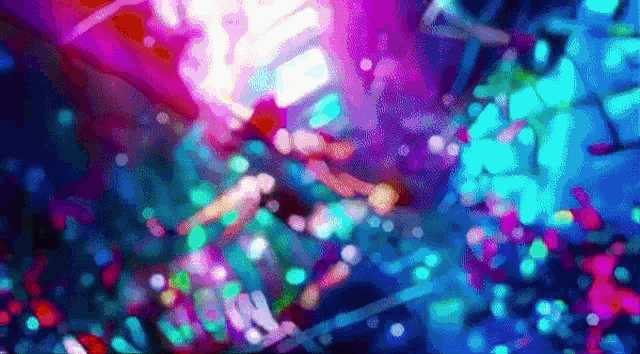 a blurry picture of a purple and blue background with a lot of lights