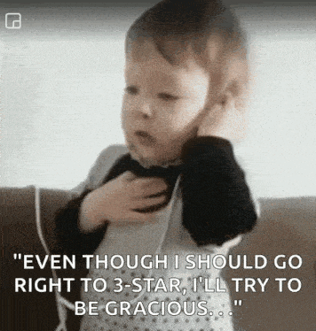 a baby is sitting on a couch with headphones on his ears and a quote .