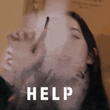 a woman is smoking a cigarette and the word help is on the bottom