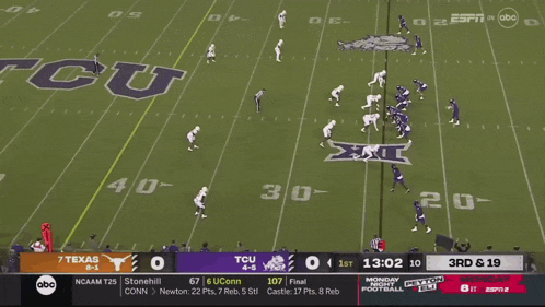 a football game between texas and tcu is being played