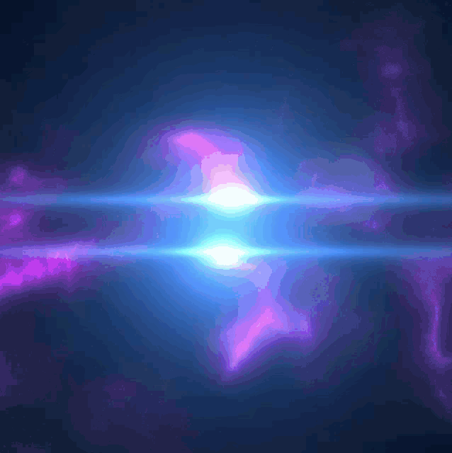 a bright blue light in the middle of a dark blue sky