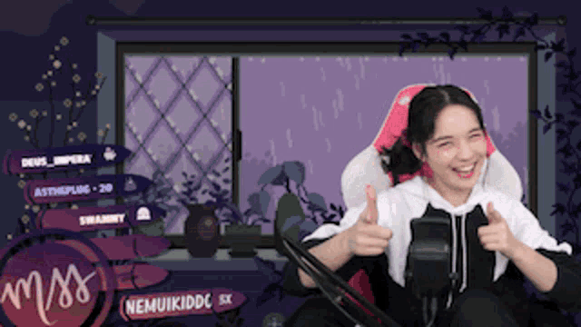 a girl is giving a thumbs up in front of a screen that says nemuikiddc ex