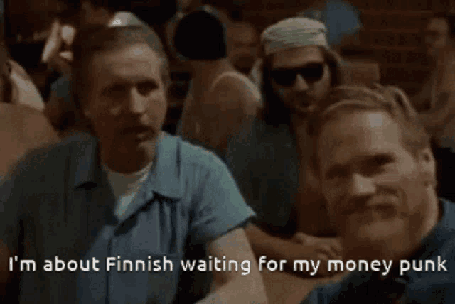 a group of men are sitting at a table and one of them says i 'm about finnish