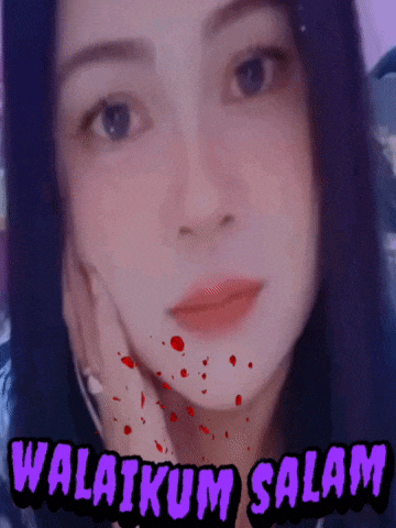 a close up of a woman 's face with the words " walaikum salam " below her