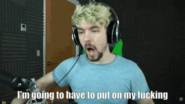 a man wearing headphones with the words i 'm going to have to put on my fucking below him