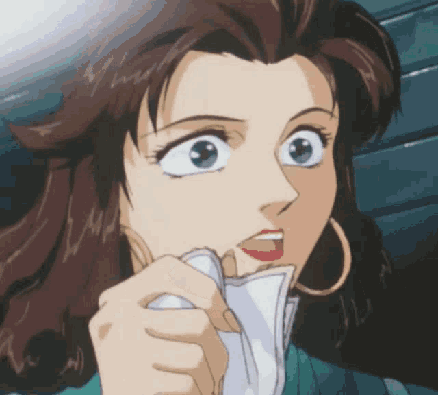 a close up of a woman 's face with a white cloth in her hand