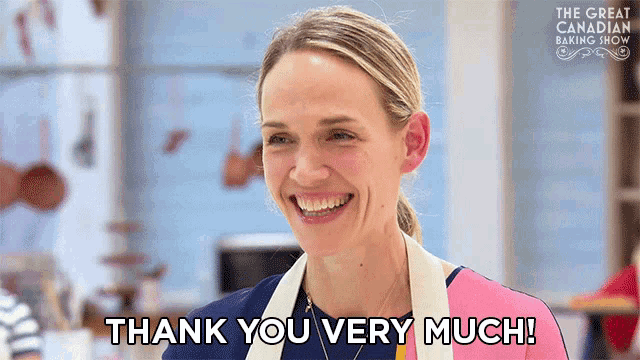 a woman is smiling and saying thank you very much on the great canadian baking show