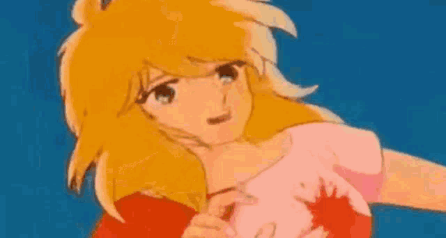 a close up of a cartoon girl with blonde hair and a pink shirt on .