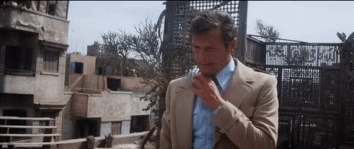 James Bond Roger Moore GIF - James Bond Roger Moore What A Helpful Chap GIFs