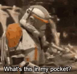 a clone trooper is kneeling down and asking what 's in his pocket .