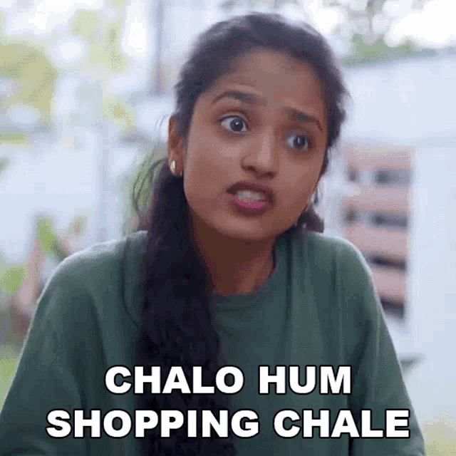 a woman is making a funny face and says chalo hum shopping chale