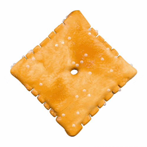 a cracker with a hole in the middle and sprinkles on it