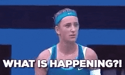 a woman in a blue tank top is standing on a tennis court and asking what is happening .