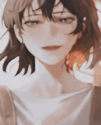 a close up of a person 's face with a blurred background . the person is holding an apple in their hand .