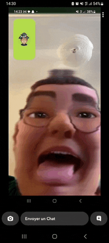 a phone screen shows a man making a funny face and the time is 14:30
