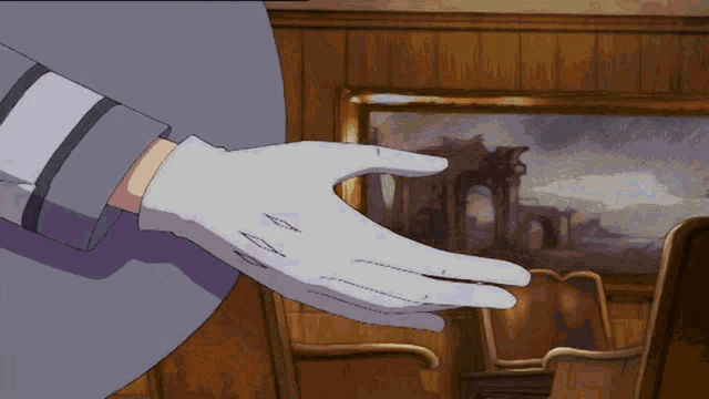 a person wearing a white glove is reaching out