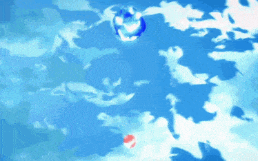 a blue and white ball is floating in the sky