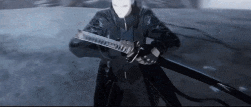 a man in a black jacket is holding a sword in his hands .