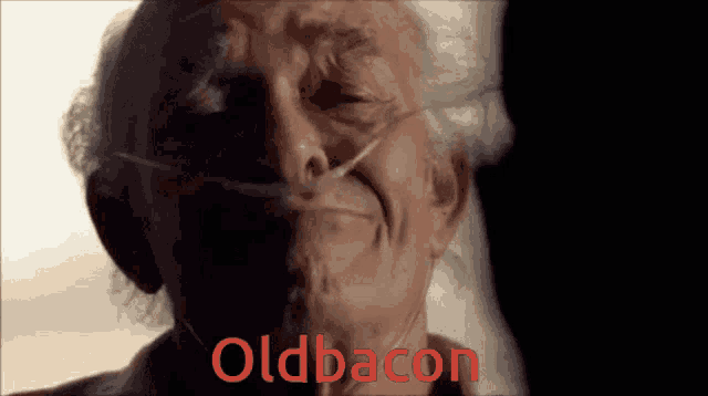 an elderly man with an oxygen tube in his nose has the word old bacon on the bottom