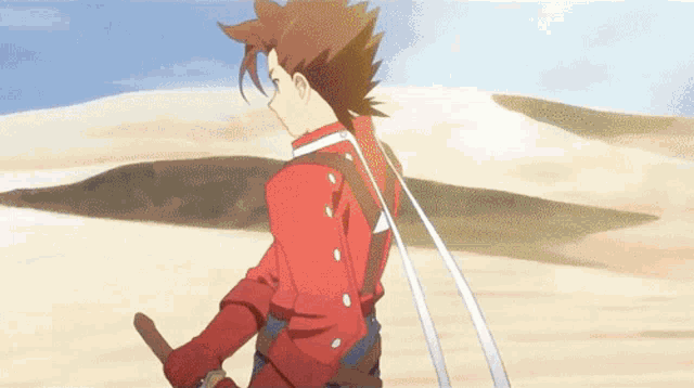 a man in a red jacket is walking in the desert with a sword in his hand .
