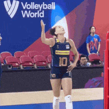 a female volleyball player with the number 10 on her shorts