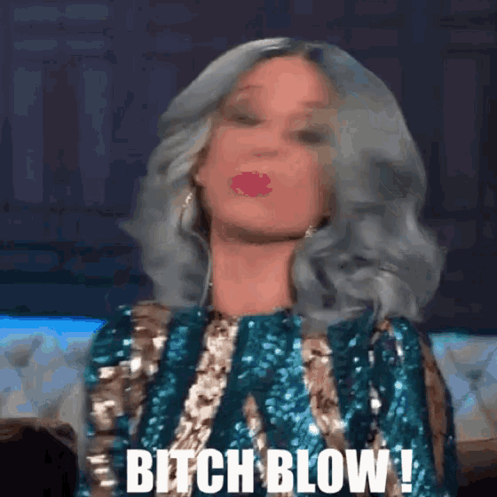 a woman in a sequined dress says bitch blow