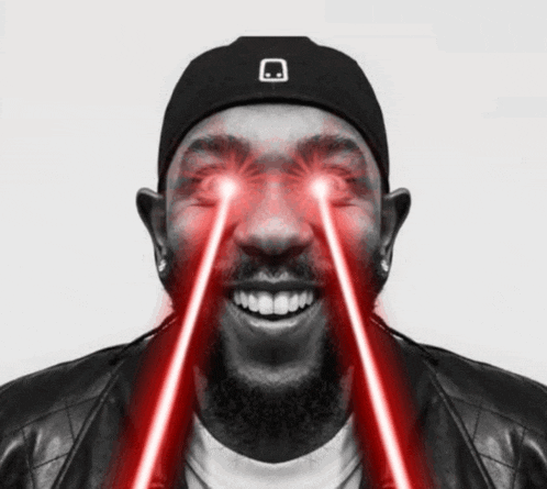 a man wearing a black hat and a leather jacket is smiling with two red lights coming out of his eyes