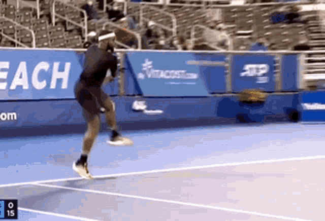 a tennis player jumps in the air while playing tennis