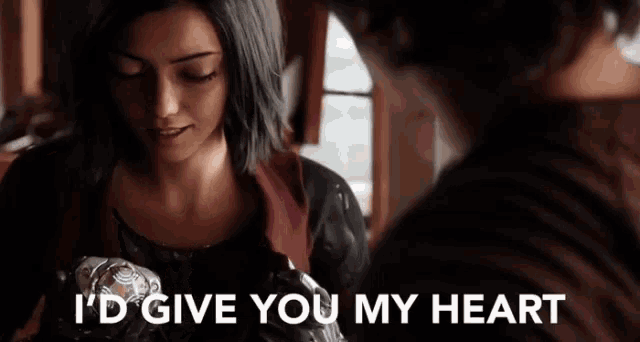 a woman is sitting next to a man and says i 'd give you my heart .