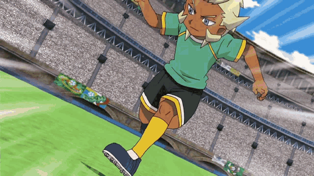 a boy in a green shirt and yellow shorts is running on a field