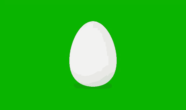 a white egg against a green background with a shadow