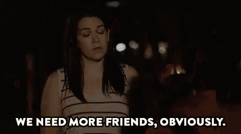 a woman in a striped tank top is standing in the dark and saying `` no , we don 't '' .