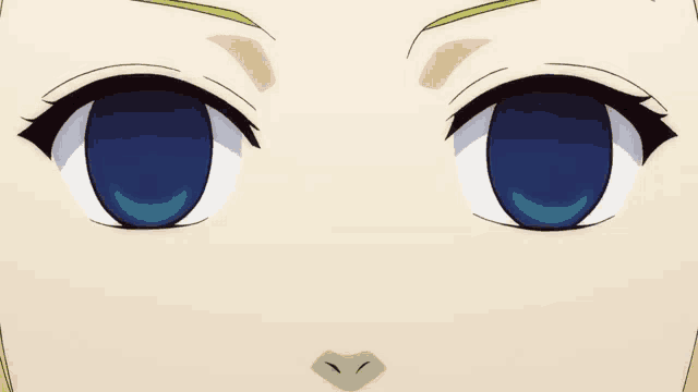 a close up of a person 's eyes with a yellow eyebrow